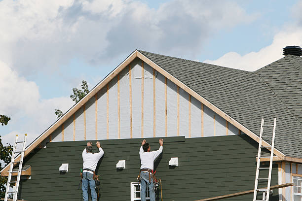 Professional Vinyl Siding technician working in Fort Bragg, NC